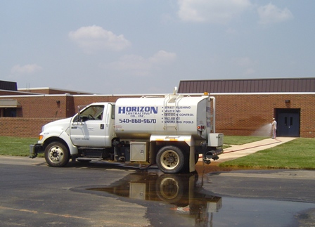 Smaller Flushtruck watering sod